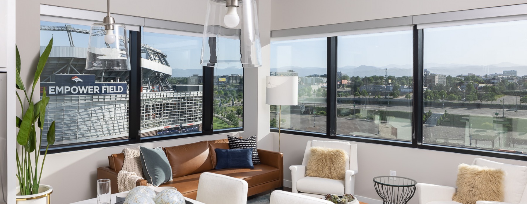 Corner living room with ample windows and light